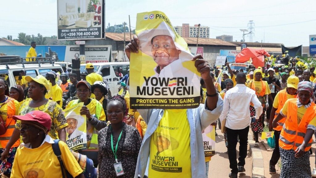 Supporters of Uganda's President and the leader of ruling National Resistance Movement (NRM) party, Yoweri Museveni, march along the street before attending his campaign rally in Kampala, Uganda January 13, 2026. (Reuters/Michael Muhati)
