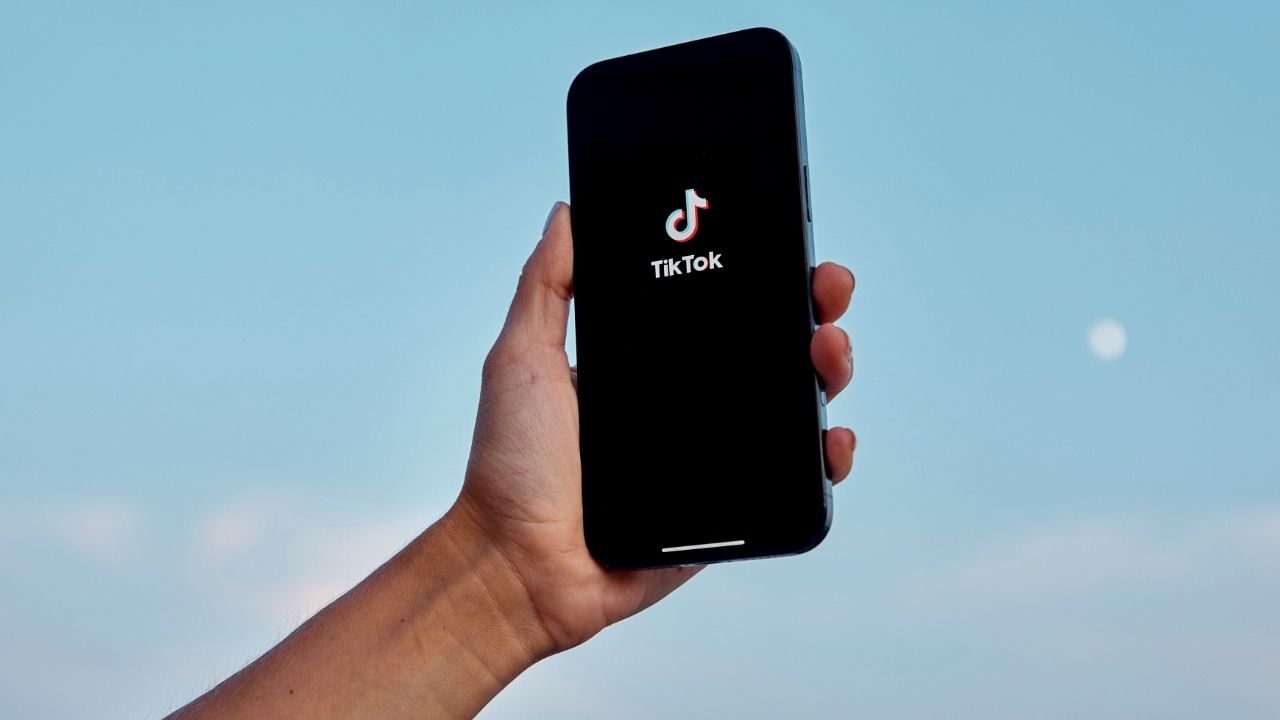 The TikTok app is displayed on a smartphone in Jersey City, N.J., on Aug. 3, 2025. TikTok has changed its terms and conditions and privacy policies for American users, expanding its ability to target advertising and track the location of people who give the app permission to do so. (Andres Kudacki/The New York Times)
