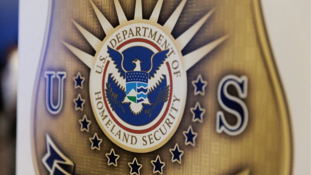 The seal of the U.S. Department of Homeland Security is printed on a sign during a U.S. Immigration and Customs Enforcement (ICE) two-day job fair in Texas to help fill vacancies for deportation officers and attorneys, in Arlington, Texas, U.S. August 26, 2025. (Reuters File)