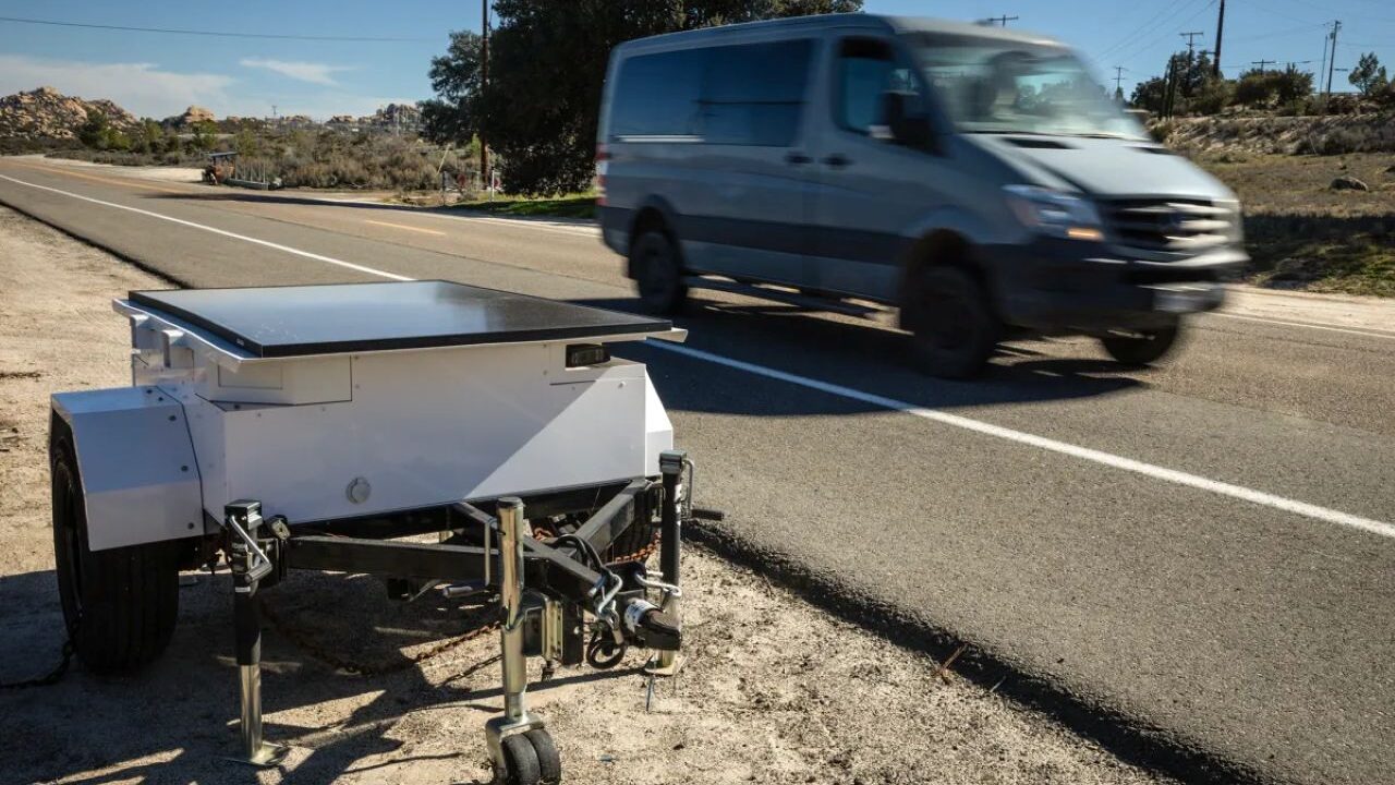 Image of a van driving past an automated license plate reader on southern California's Old Highway 80