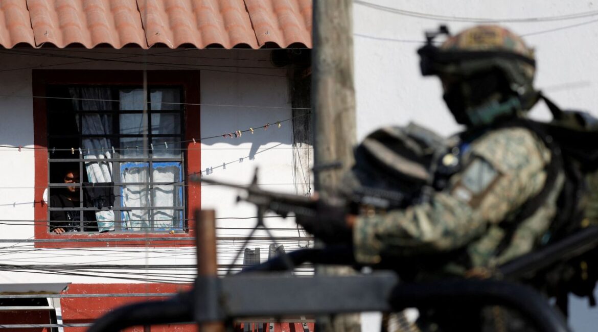 Image of Mexico's military patrolling a street in Puerto Vallarta.