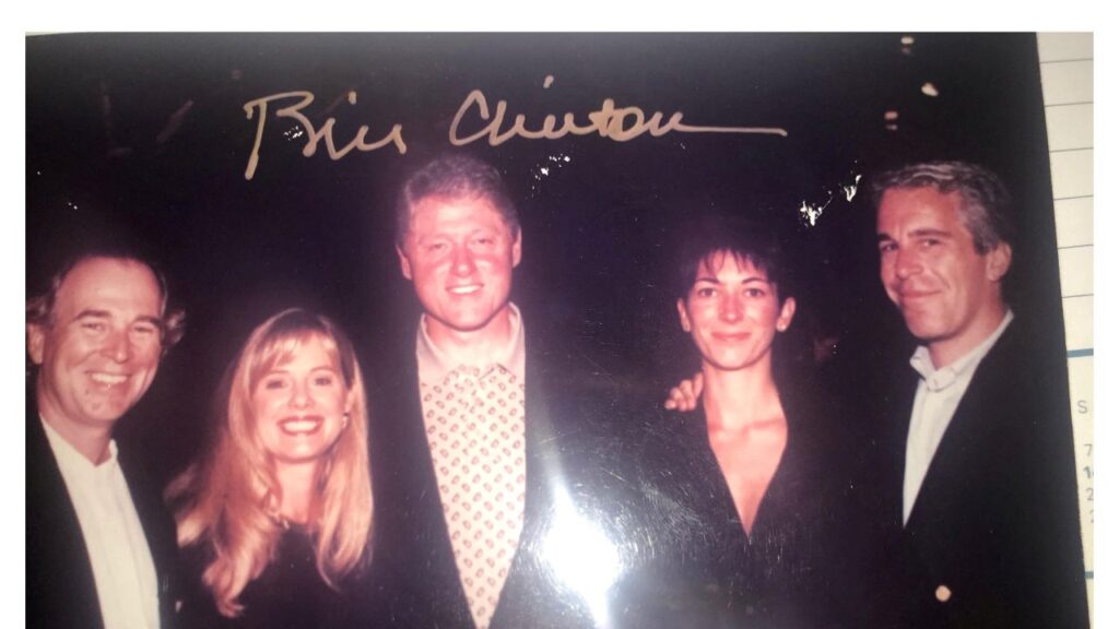 Image of Bill Clinton at a party with convicted sex traffickers Ghislaine Maxwell and the late financier Jeffrey Epstein.