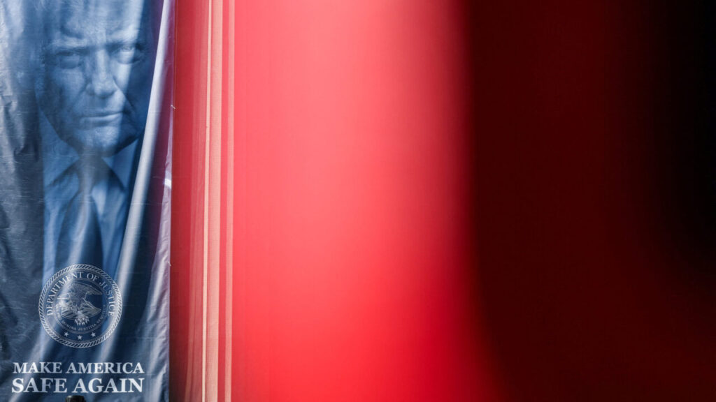 Image of President Trump on a banner at the Department of Justice