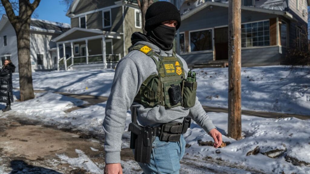 A Border Patrol agent wearing a body camera stops to confront a vehicle that had been following his unit in Minneapolis, on Thursday, Jan. 29, 2026. As the aggressive tactics of federal officers advancing President Trump’s immigration crackdown have come under scrutiny, the use of body cameras has emerged as a rare point of bipartisan agreement in negotiations over a spending bill to keep the Department of Homeland Security running. (Victor J. Blue/ The New York Times)