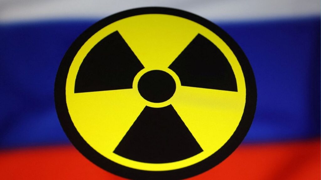 A Russian flag and a nuclear sign are seen in this illustration taken March 13, 2024. (Reuters/Dado Ruvic/Illustration)