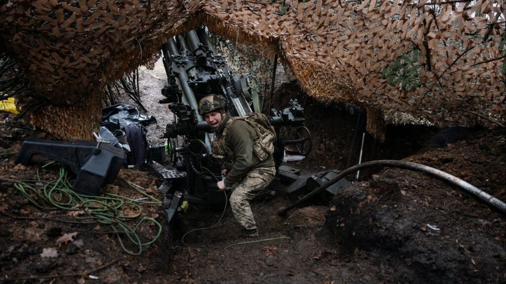 A Ukrainian artillery unit fires a howitzer at Russian positions near Pokrovsk, in eastern Ukraine, Dec. 21, 2025. Russian troops have advanced at a glacial pace in recent months, but gains in southern and eastern Ukraine could give Moscow an edge in U.S.-mediated peace talks. (Tyler Hicks/The New York Times)