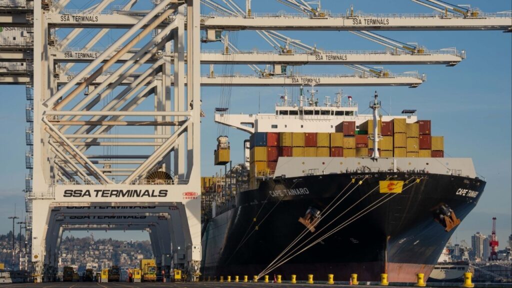 A container ship at the Port of Seattle, on Dec. 30, 2025. U.S. imports grew and the trade deficit remained historically large last year, data released on Feb. 19 showed, as steep tariffs imposed by the Trump administration scrambled trade but did not halt it. (Ruth Fremson/The New York Times)