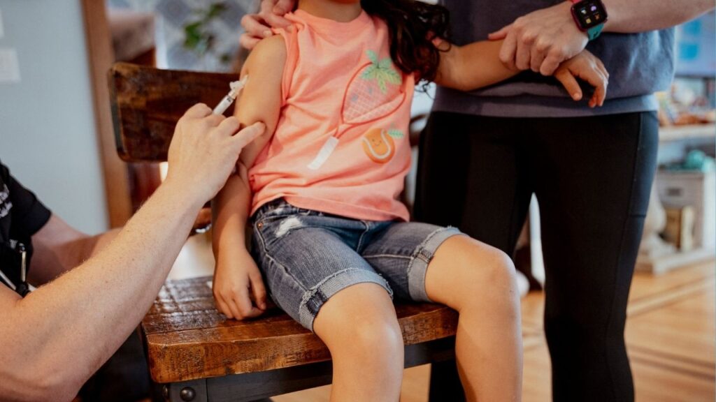 A flu vaccine is prepared in Mountain Lakes, N.J., Sept. 16, 2025. Flu levels are rising once again across the United States, with emergency department visits increasing among children over 5, according to data from the Centers for Disease Control and Prevention. (Laila Stevens/The New York Times)