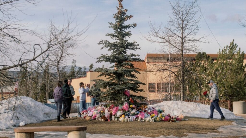 A makeshift memorial for the victims of a mass shooting at Tumbler Ridge Secondary School in Tumbler Ridge, British Columbia, Feb. 12, 2026. Canadian officials have summoned leaders from OpenAI for a meeting following revelations that the company did not inform the authorities about a user whose account had been suspended months before she committed a mass murder in British Columbia. (Alana Paterson/The New York Times)