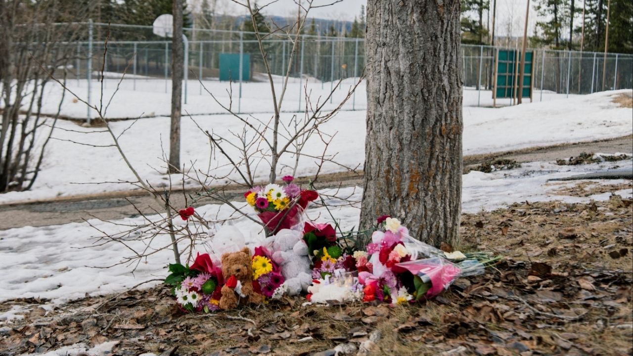 A makeshift memorial near a middle and high school building where a shooting took place on Tuesday in Tumbler Ridge, British Columbia, Canada, on Wednesday, Feb. 11, 2026. The Canadian authorities on Wednesday identified the suspect in the mass shooting as an 18-year-old who killed her mother and stepbrother before fatally shooting several others at the school. (Alana Paterson/The New York Times)