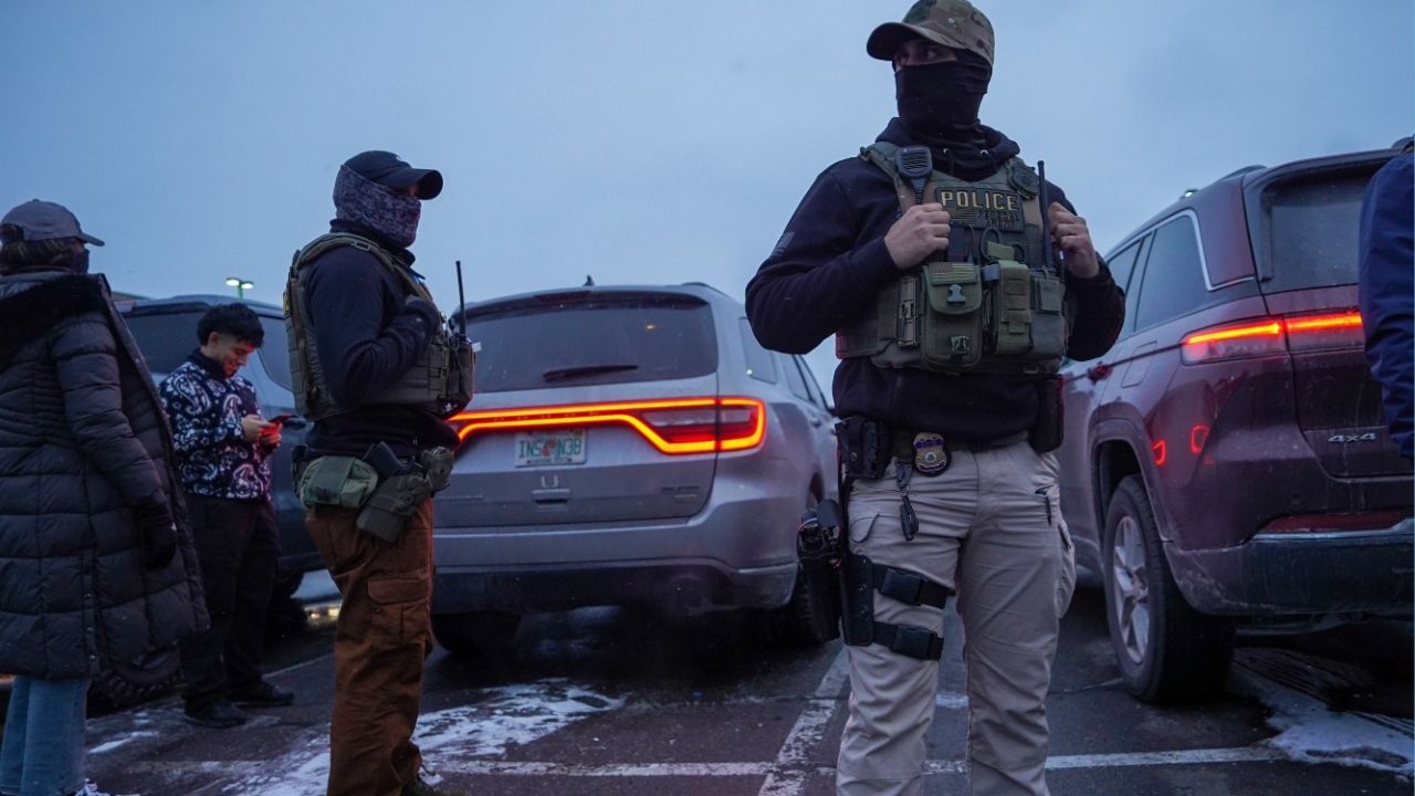 A man is briefly detained by federal agents in the parking lot of a Menards Home Improvement store in Richfield, Minn. on Jan. 10, 2026. ICE agents use facial recognition, social media monitoring and other tech tools not only to identify undocumented immigrants but also to track protesters, current and former officials said. (Ryan Murphy/The New York Times)