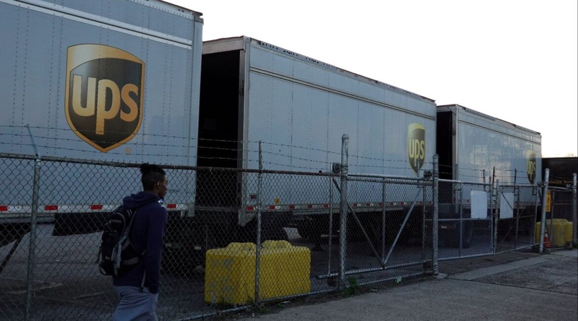 A person walks by United Parcel Service (UPS) trailers at a facility in Brooklyn, New York City, U.S., May 9, 2022. (Reuters File)