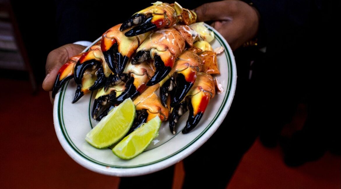 A plate of stone crabs at Joe’s Stone Crab restaurant in Miami Beach, Fla., Dec. 7, 2018. Jo Ann Bass, the matriarch of Joe’s Stone Crab, a century-old family restaurant that leveraged the claws of a ubiquitous local crustacean in becoming a Miami Beach institution, not unlike the Fontainebleau hotel and the Art Deco jewels of Ocean Drive, died on Jan. 31, 2026, at her home in that city. She was 94. (Saul Martinez/The New York Times).