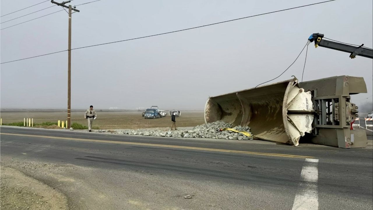A side-dump trailer overturned in a two-vehicle crash involving a Chevrolet 2500 and a Peterbilt 386 at the intersection of Road 208 and Avenue 128 on Thursday, Feb. 5, 2026. (CHP)