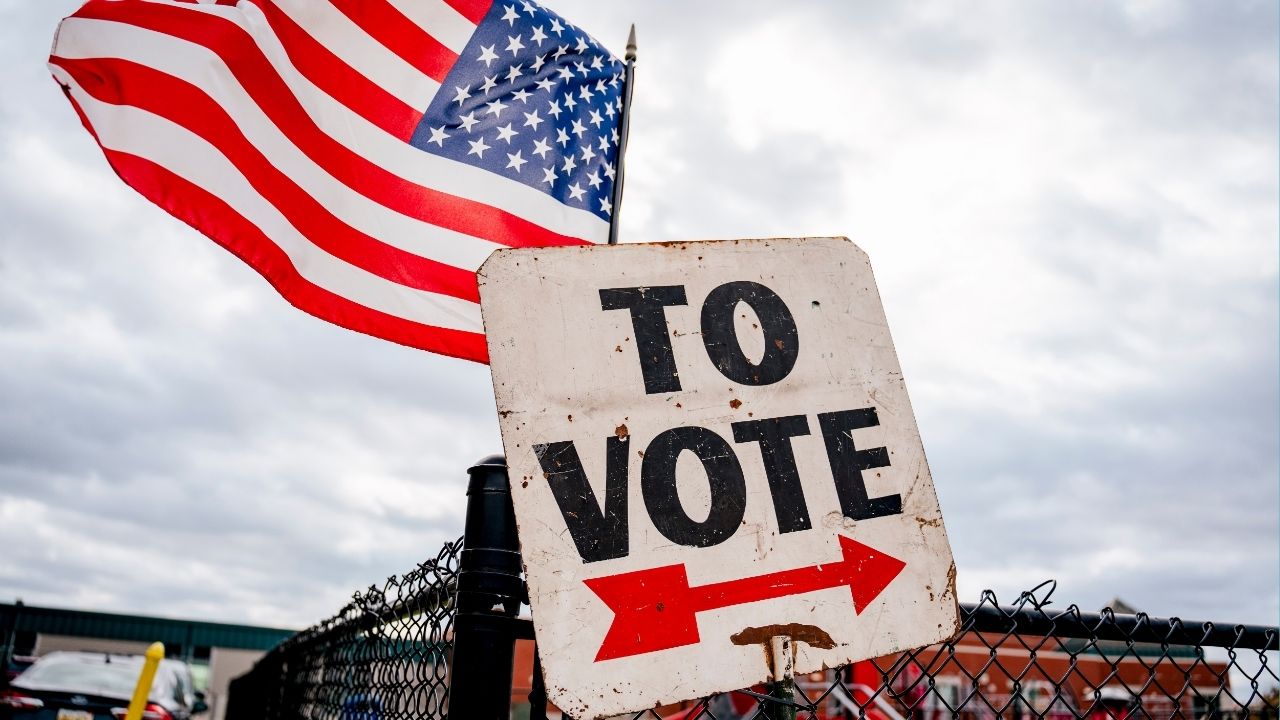 A sign directs voters in Dearborn, Mich., Nov. 5, 2024. President Donald Trump doubled down on his extraordinary call for the Republican Party to “nationalize” voting in the United States, even as the White House tried to walk it back and members of his own party criticized the idea. (Nick Hagen/The New York Times)