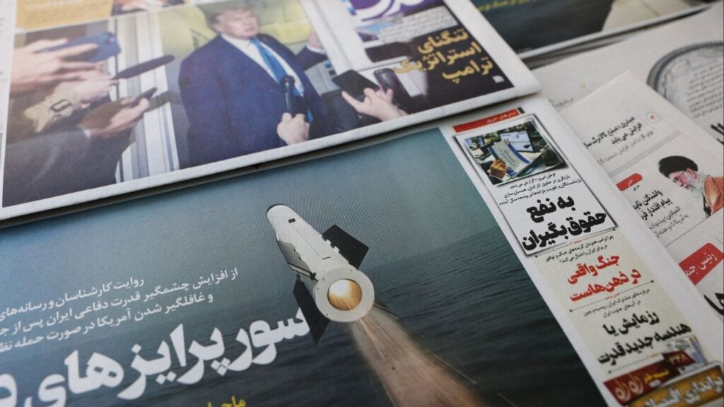 An Iranian newspaper with a cover photo of an Iranian missile, in Tehran, Iran, February 19, 2026. (Majid Asgaripour/WANA (West Asia News Agency) via Reuters)