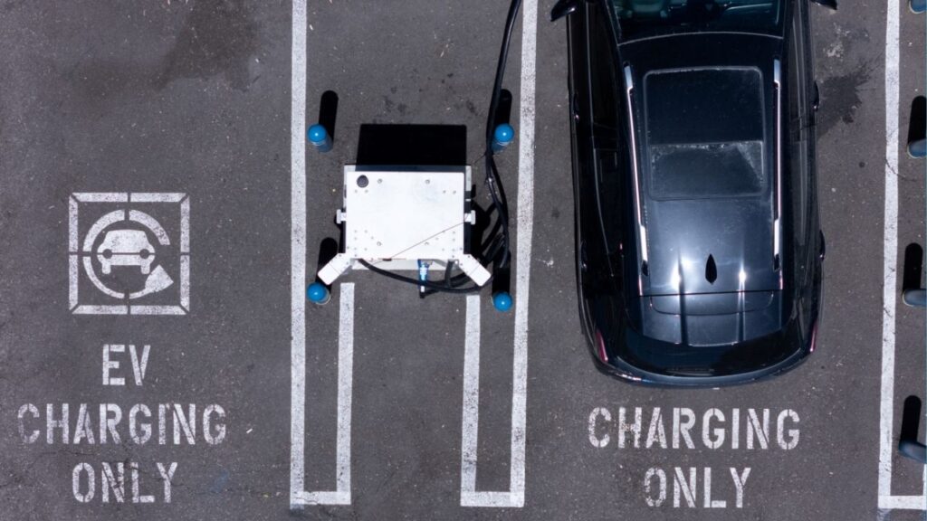 An electric vehicle charging location is shown from the view of a drone in Carlsbad, California, U.S., May 14, 2025. (Reuters/Mike Blake)