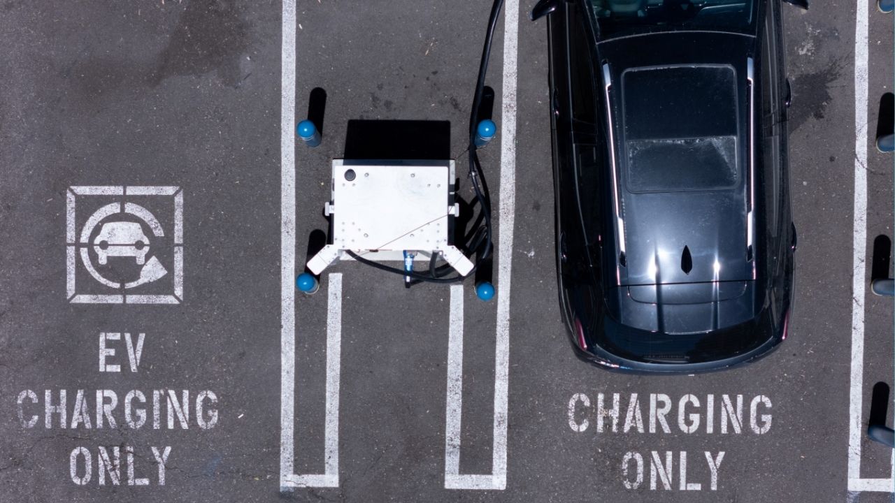 An electric vehicle charging location is shown from the view of a drone in Carlsbad, California, U.S., May 14, 2025. (Reuters/Mike Blake)