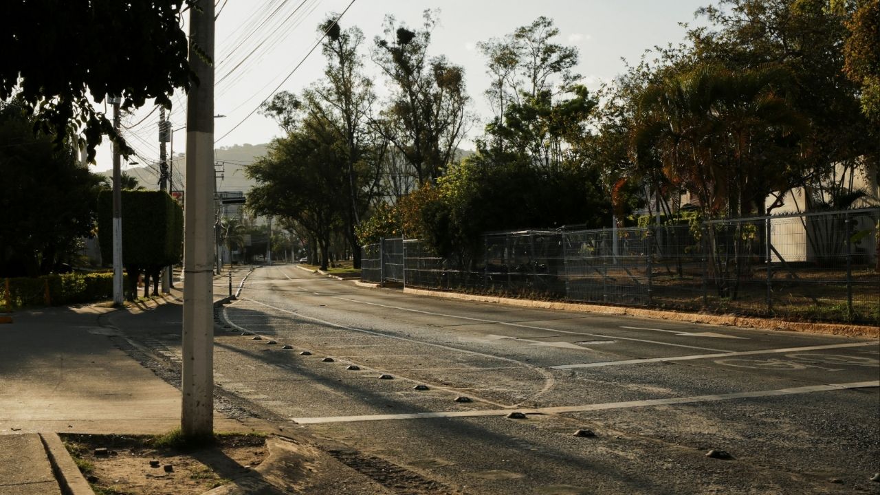 An empty street after a wave of blockades and attacks on businesses by members of organized crime following a military operation in which Mexican officials said cartel boss Nemesio Oseguera, "El Mencho," was killed, at a tourist area, in Zapopan, Mexico, February 22, 2026. (Reuters/Gabriel Trujillo)