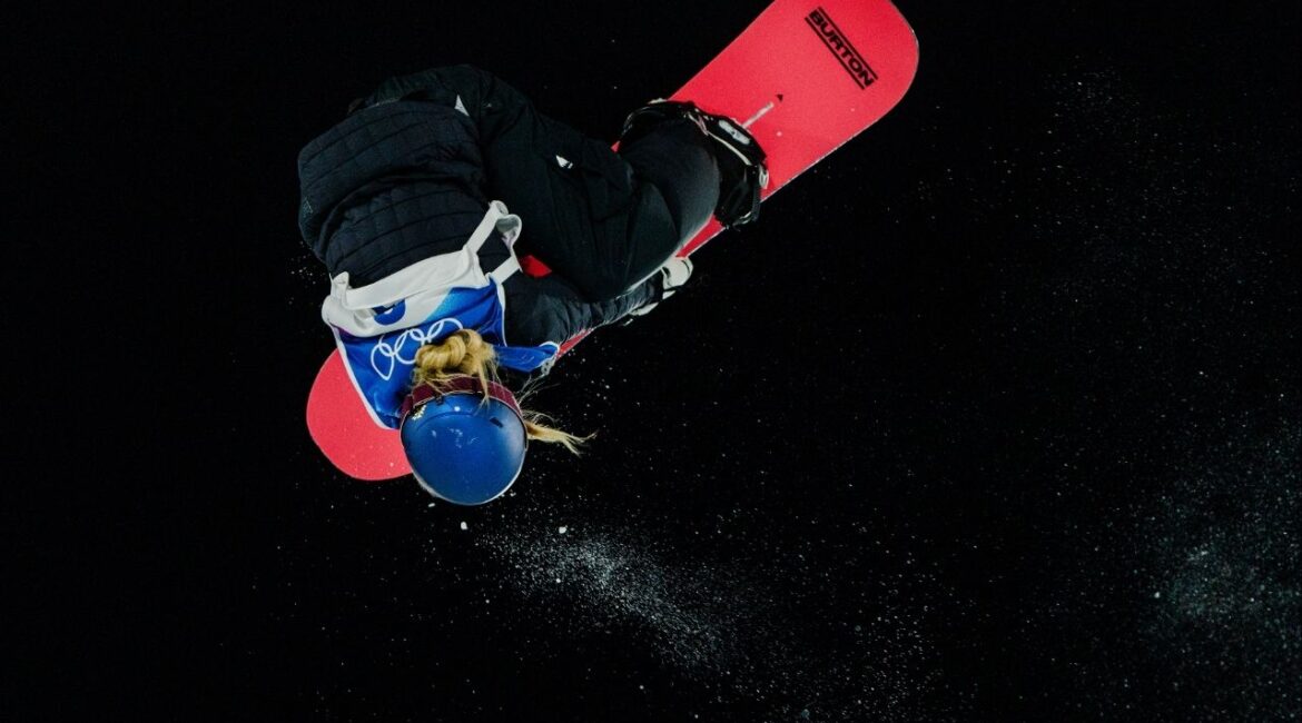Anna Gasser, of Team Austria, competes in the women’s snowboarding big air final at the 2026 Milan Cortina Olympics in Livigno, Italy, Feb. 9, 2026. When your child races headfirst down an ice chute, leaps off ski jumps or performs snowboard tricks in midair, a medal may not be the main thing you pray for. (Gabriela Bhaskar/The New York Times)