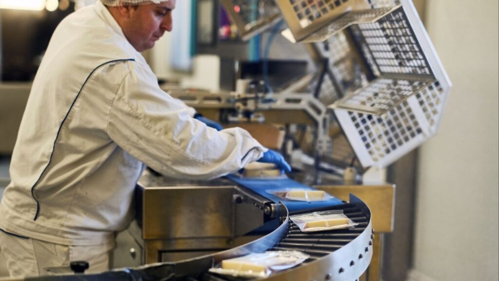 Antony Margot, a fifth generation cheesemaker, at work at Margot Fromages in Yverdons-les-Bains, Switzerland, on Oct. 30, 2025. A European lawmaker has warned that U.S. tariffs on cheeses like Parmesan and Camembert could nearly double, to about 30 percent. (Lea Meienberg/The New York Times)