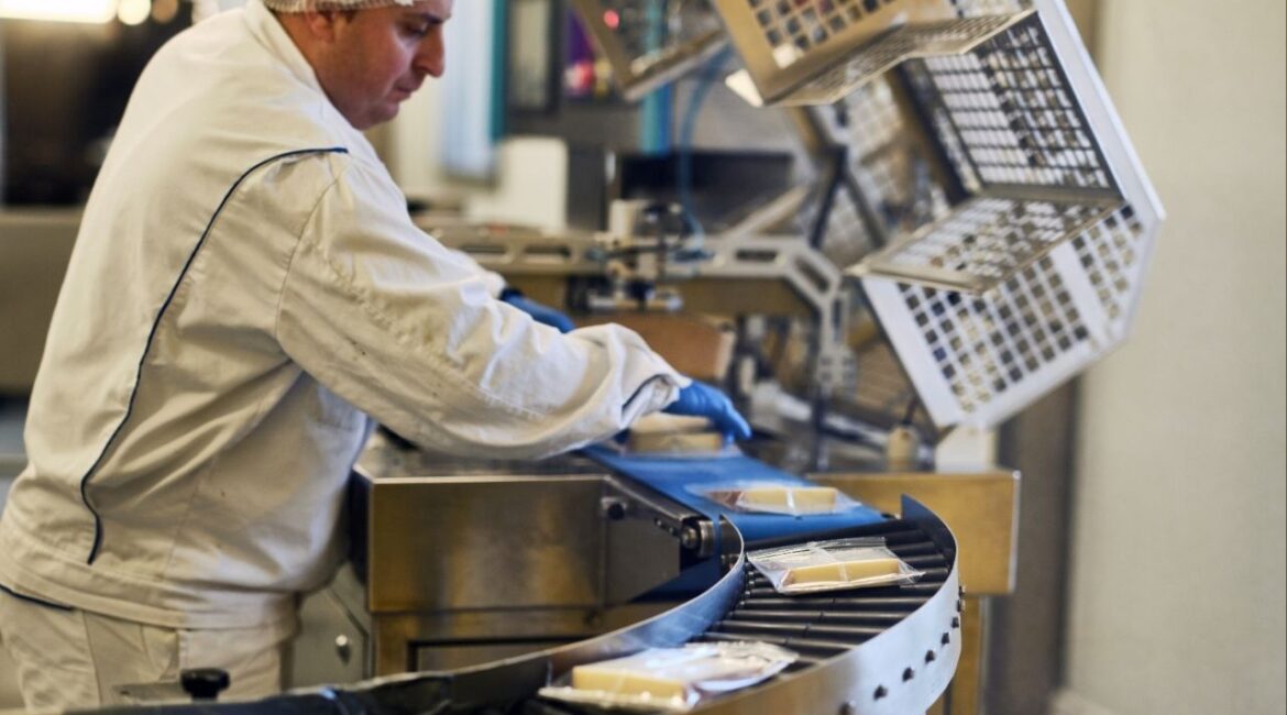 Antony Margot, a fifth generation cheesemaker, at work at Margot Fromages in Yverdons-les-Bains, Switzerland, on Oct. 30, 2025. A European lawmaker has warned that U.S. tariffs on cheeses like Parmesan and Camembert could nearly double, to about 30 percent. (Lea Meienberg/The New York Times)