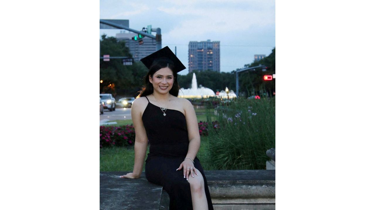 Babson College student Any Lucia Lopez Belloza poses wearing a mortarboard after graduating from high school in Boston, Massachusetts, U.S., in 2025. massdeportationdefense.org/Handout via (Reuters/File Photo)