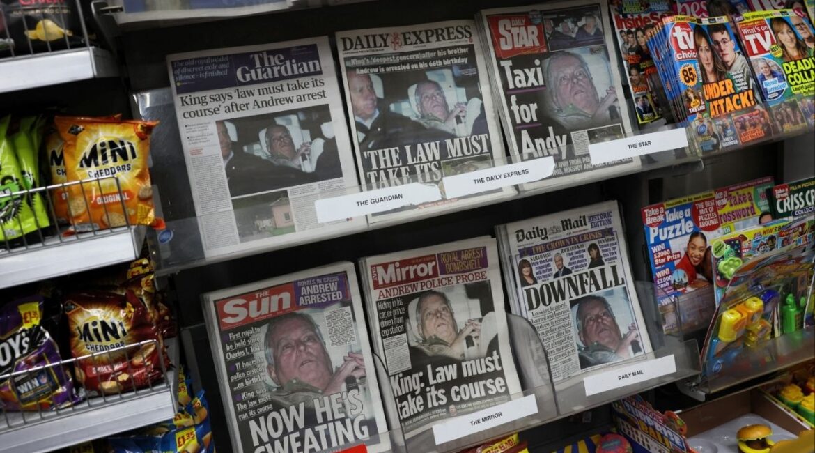 British newspapers, featuring coverage of the arrest of Andrew Mountbatten-Windsor, younger brother of Britain's King Charles, on suspicion of misconduct in public office, sit on display in a newsagent in London, Britain, February 20, 2026. (Reuters/Jack Taylor)
