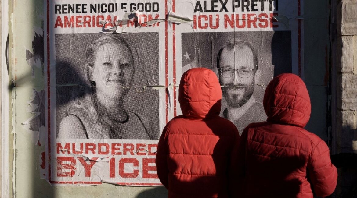 Children look at posters honoring Alex Pretti and Renee Nicole Good, who were fatally shot by federal immigration agents in separate incidents on January 24 and January 7, respectively, near the site of Pretti’s death, in Minneapolis, Minnesota, U.S., January 31, 2026. (Reuters/Tim Evans)