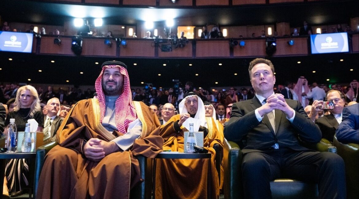 Elon Musk and Saudi Arabia Crown Prince Mohammed bin Salman listen as President Donald Trump delivers remarks at a Saudi Arabia Investment forum at the Kennedy Center in Washington, Nov. 19, 2025. Humain, which was created by Crown Prince Mohammed bin Salman last year, said it made the investment just before xAI was acquired by SpaceX. (Haiyun Jiang/The New York Times)