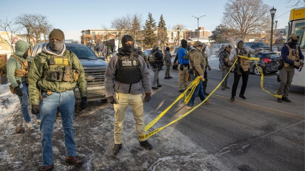 Federal agents block off the intersection of Nicollet Avenue and 26th Street as protestors gather for a rally, in Minneapolis, Jan. 24, 2026. New polls show that a vast majority of Republicans still support President Trump’s aggressive immigration enforcement, which led to the killing of two protesters in Minneapolis last month. (David Guttenfelder/The New York Times)