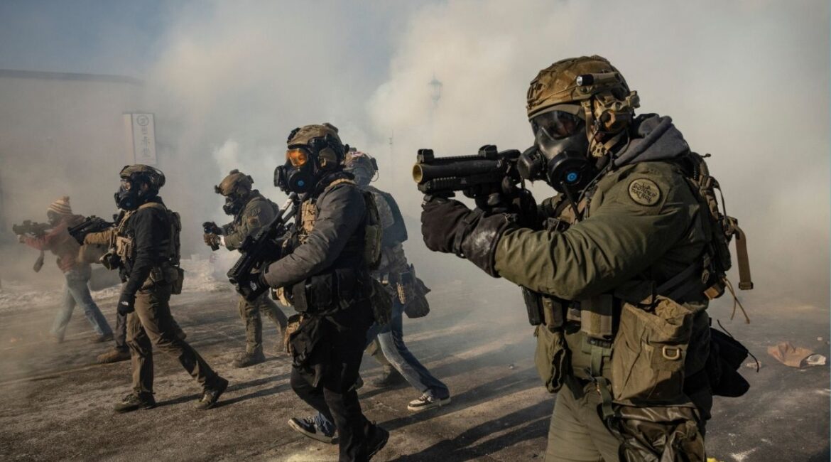 Federal agents confront protesters in Minneapolis, Jan. 24, 2026. A proposal in a 1987 law review article could address a gap that makes it all but impossible to sue federal officials for violating the Constitution. (David Guttenfelder/The New York Times)