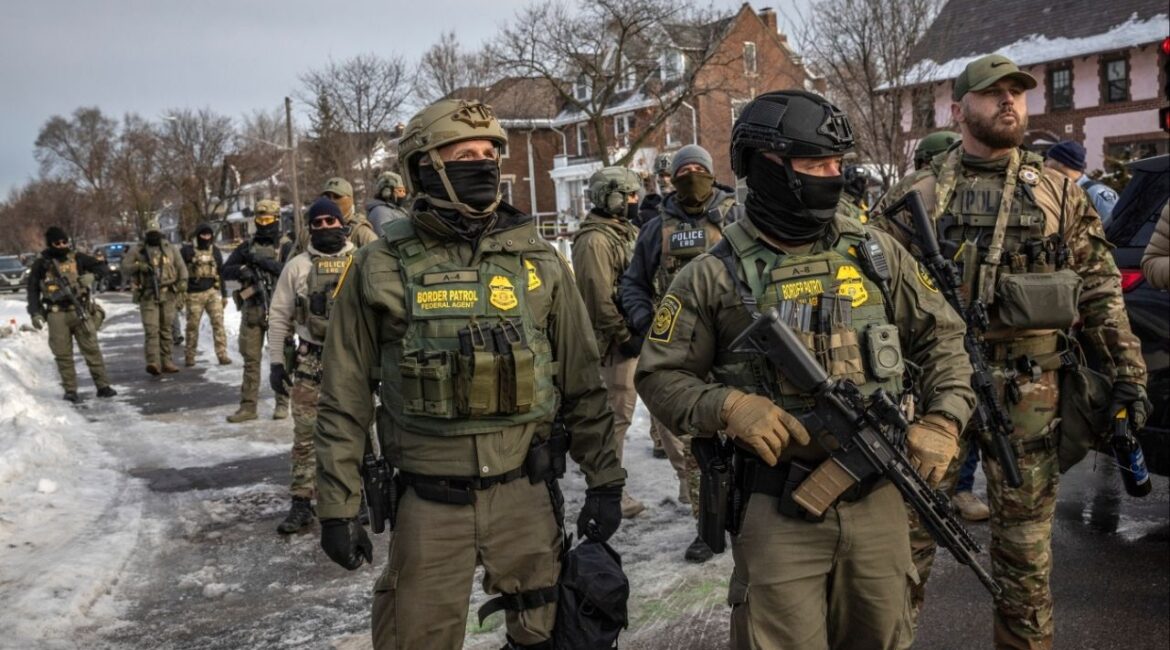 Federal agents try to leave the scene of the fatal shooting of Renee Nicole Good in Minneapolis, on Wednesday, Jan. 7, 2026. More than 800 Google employees delivered a petition to management on Feb. 6., urging the company to stop providing cloud service hosting to the Trump administration’s immigration agencies. (David Guttenfelder/The New York Times)