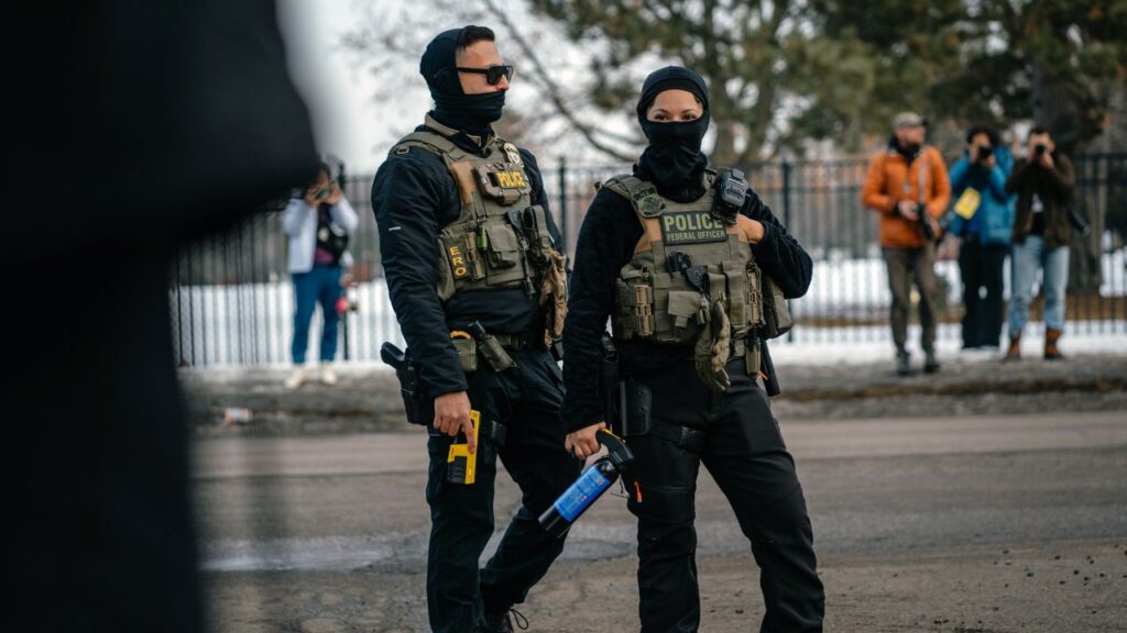 Federal immigration officers in Minneapolis on Thursday, Feb. 5, 2026. Tom Homan, the White House border czar, said on Feb. 12,2026, that he would end the aggressive immigration enforcement operation in Minnesota that began late last year and resulted in thousands of arrests, as well as the shootings of three people. (Jamie Kelter Davis/ The New York Times)