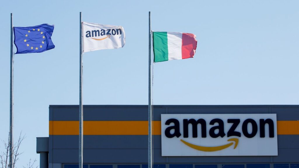 Flags flutter outside a distribution centre, during a strike at Amazon's logistics operations in Italy, in Passo Corese, Italy March 22, 2021. (Reuters/Remo Casilli)