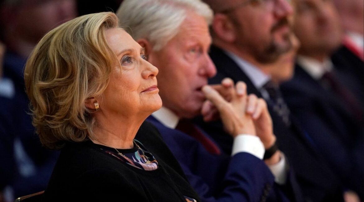 Former U.S. Secretary of State Hillary Clinton listens to speakers during the international conference to mark the 25th anniversary of the Good Friday Agreement, in Belfast, Northern Ireland, April 19, 2023. (Niall Carson/Pool via Reuters)