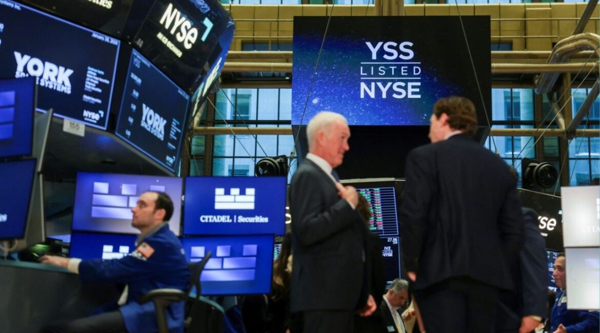 Logos of York Space Systems are displayed on screens during the company's IPO at the New York Stock Exchange (NYSE) in New York City, U.S., January 29, 2026. (Reuters/Jeenah Moon)