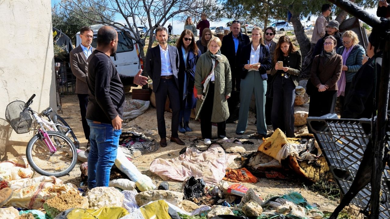 Members of a European Union delegation visit a site, which Palestinians say was damaged by Israeli settlers, in Susiya near Hebron in the Israeli-occupied West Bank February 25, 2026. (Reuters/Mussa Qawasma)
