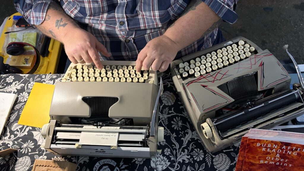 Michael Jasso's dual typewriter set up at the monthly Art Hop on Feb. 5. (Maryanne Casas-Perez/ GV Wire)