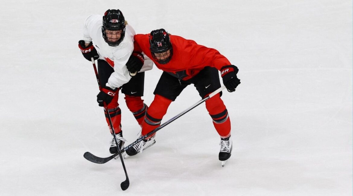 Milano Cortina 2026 Olympics - Ice Hockey - Canada Women's Training - Milano Rho Ice Hockey Arena, Milan, Italy - February 04, 2026. Renata Fast and Emma Maltais of Canada during training (Reuters/Susana Vera)