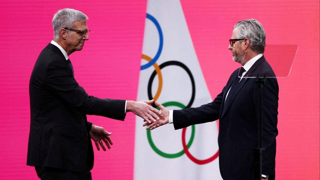 Milano Cortina 2026 Winter Olympics - 145th IOC Session - Auditorium MPC, Milan, Italy - February 3, 2026 Chairman of the Los Angeles Organizing Committee for the 2028 Olympic and Paralympic Games, Casey Wasserman with Reynold Hoover, chief executive officer of the 2028 Summer Olympics during the 145th IOC Session. (Reuters File)
