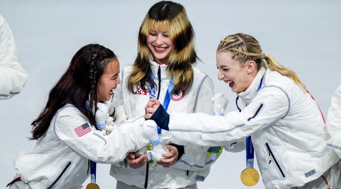 Image of American figure skaters celebrating their gold medals