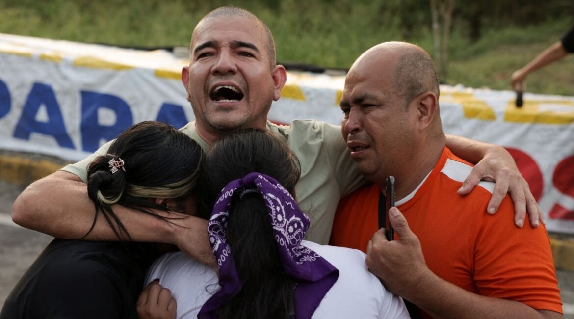 Pastor Richard Puentes hugs his family after his release from the Rodeo detention center, after Venezuelan lawmakers approved a limited amnesty bill for certain prisoners, in Guatire, Venezuela February 23, 2026. (Reuters/Gaby Oraa)