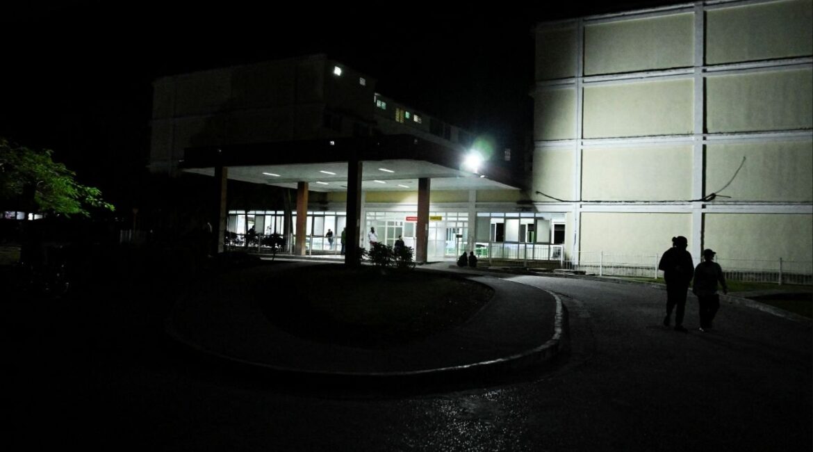 People approach the entrance of the Provincial Clinical–Surgical Hospital "Arnaldo Milian Castro," where, according to local information, injured people were being treated after an armed incident involving a Florida-registered speedboat and a Cuban patrol, at a time of heightened tensions with the United States, in Santa Clara, Cuba, February 25, 2026. (Reuters/Norlys Perez TPX IMAGES OF THE DAY)