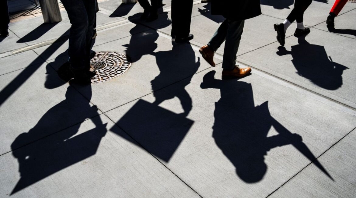 People attend a rally in support of federal workers outside the 26 Federal Plaza, a federal office building in New York City, U.S., March 25, 2025. (Reuters/Eduardo Munoz)