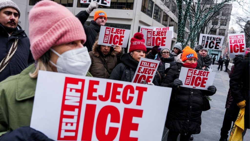 People take part in a rally to stop ICE enforcement at the Super Bowl, outside of NFL Headquarters in New York City, U.S., February 03, 2026. (Reuters/Adam Gray)