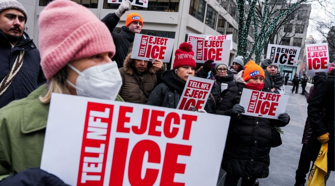 People take part in a rally to stop ICE enforcement at the Super Bowl, outside of NFL Headquarters in New York City, U.S., February 03, 2026. (Reuters/Adam Gray)