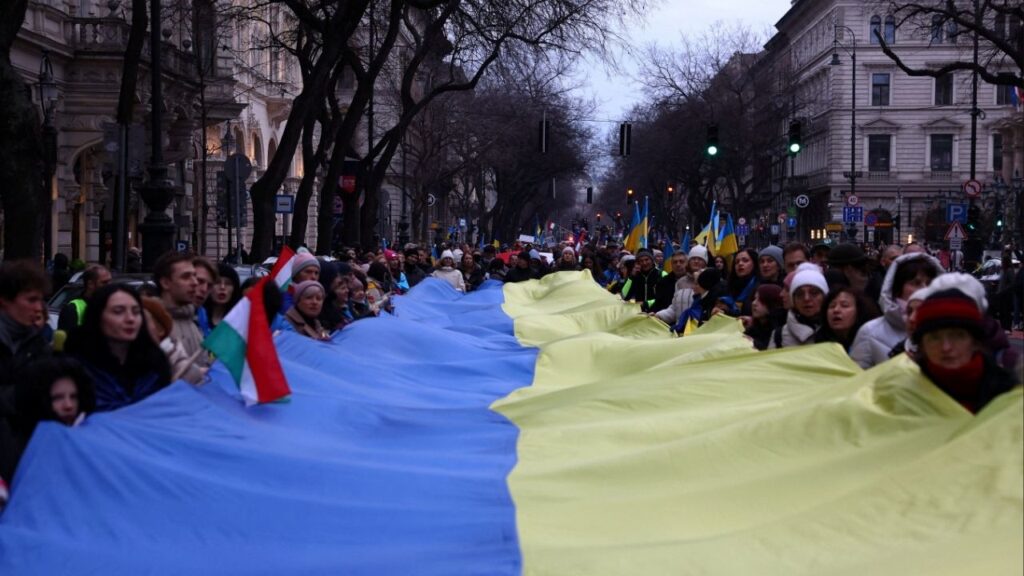 People take part in a solidarity march ahead of the fourth anniversary of the full-scale Russian invasion of Ukraine, in Budapest, Hungary February 22, 2026. (Reuters/Bernadett Szabo)