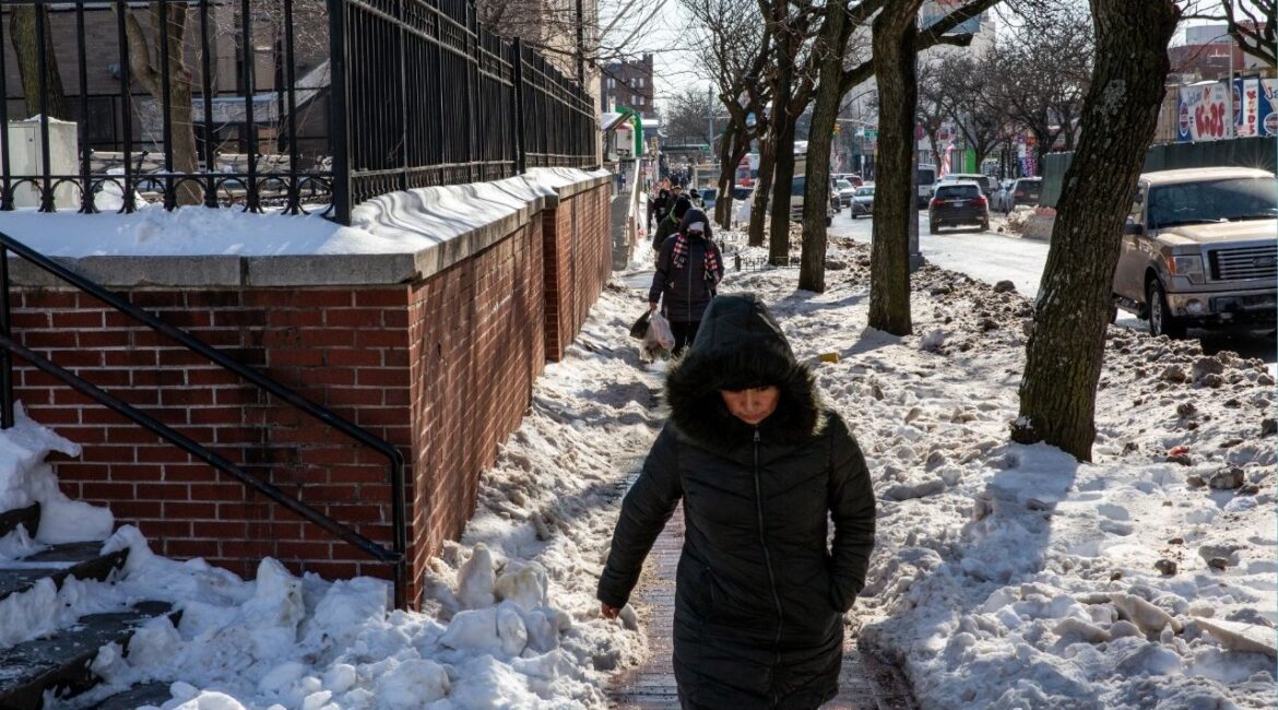People walk past the Junction Playground in Queens, Jan. 28, 2026. Arctic air will chill much of the United States, but New York’s streak of consecutive freezing days ended on Monday. (Sara Hylton/The New York Times)