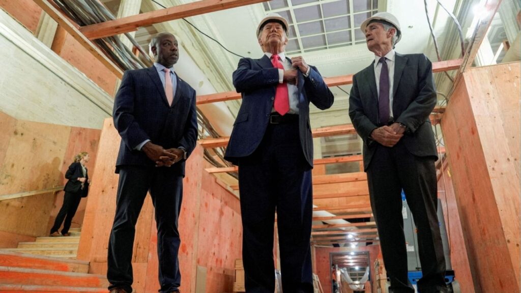 President Donald Trump, U.S. Senator Tim Scott (R-SC) and Federal Reserve Chair Jerome Powell react during a tour of the Federal Reserve Board building, which is currently undergoing renovations, in Washington, D.C., U.S., July 24, 2025. (Reuters File)